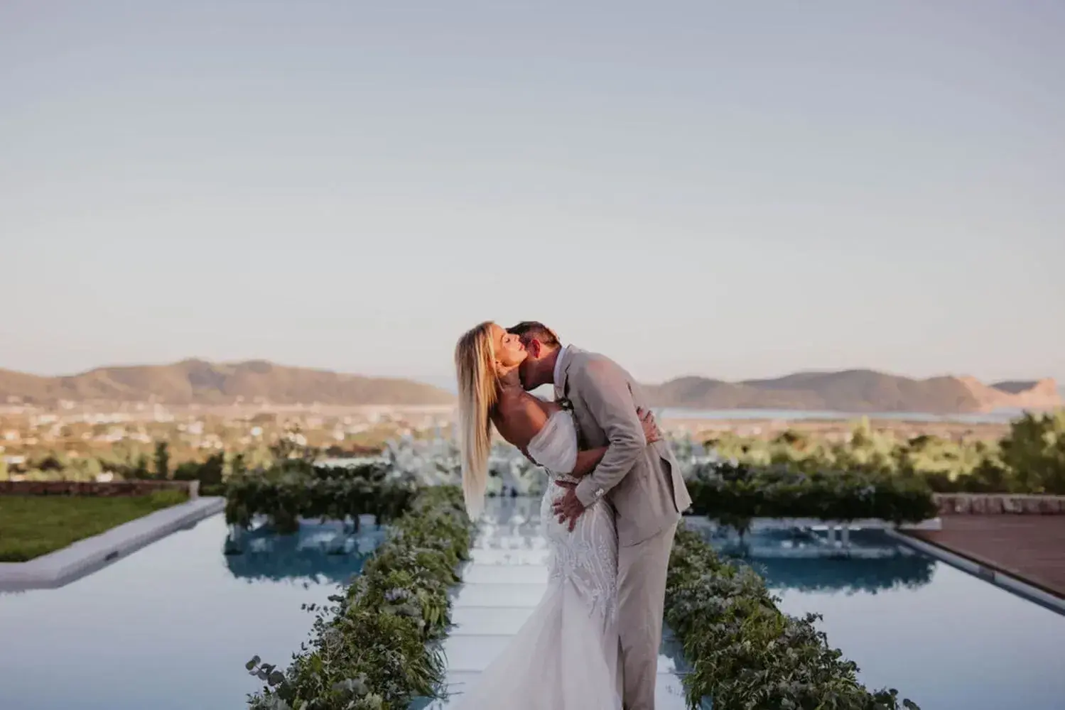 Wedding reception beside an infinity pool